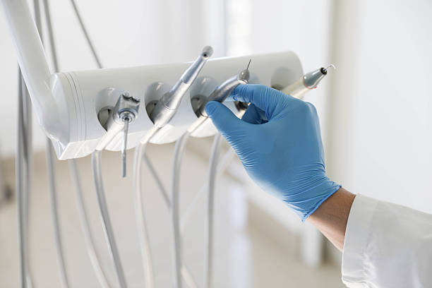 Professional Tooth Extraction technician working in West Fork, AR